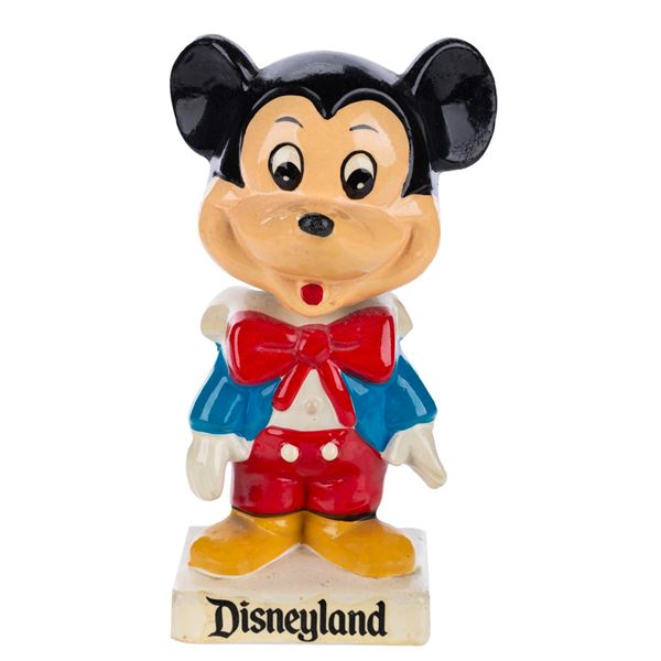 A Disneyland Mickey Mouse Ceramic Bobblehead.