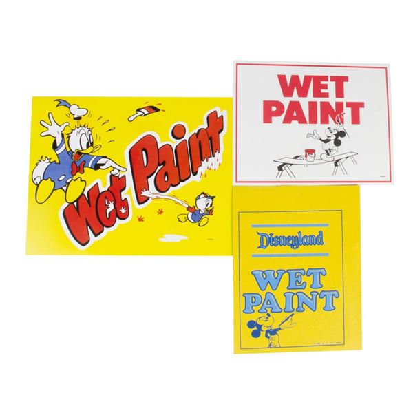 Three Wet Paint Cast Member Signs.