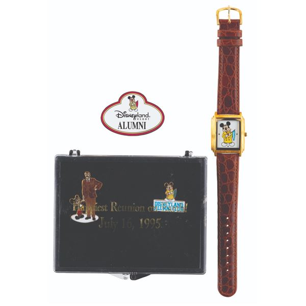 A Disneyland Alumni Watch and Pin Collection.