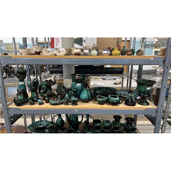 SHELF OF ASSORTED BLUE MOUNTAIN POTTERY ANIMALS, VASES, SERVING PLATES & MORE