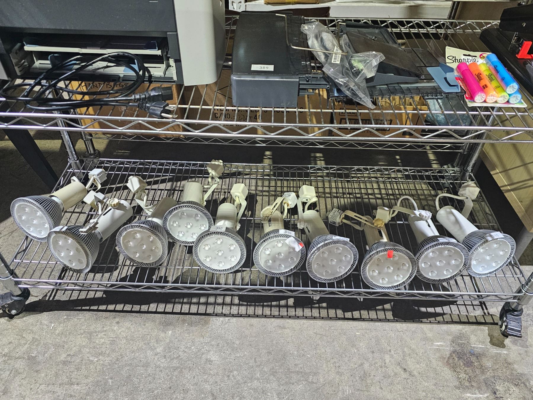 SHELF OF ASSORTED LITELINE ADJUSTABLE SPOTLIGHTS FOR MOUNTING ON A ...