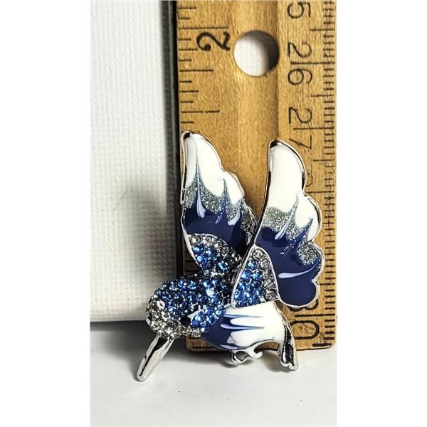 16)  SILVER TONE WITH NAVY BLUE AND WHITE