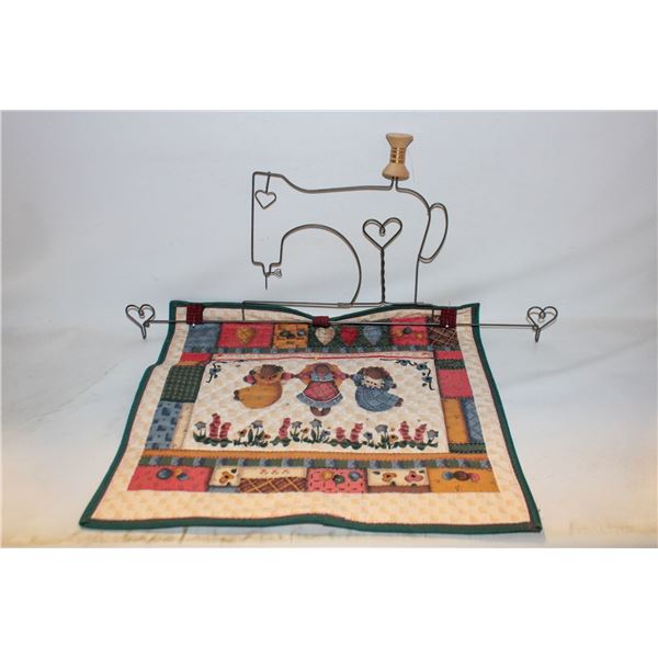 WIRE SCULPTURE OF A SEWING MACHINE WALL