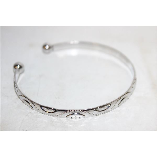 21)  EMBOSSED SILVER TONE OPEN ENDED