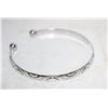 Image 1 : 21)  EMBOSSED SILVER TONE OPEN ENDED