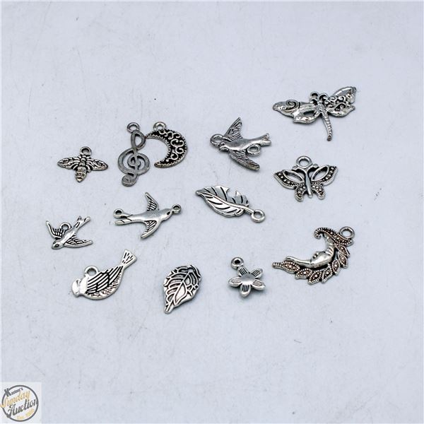 BUNDLE OF **TIBETAN SILVER PENDANTS