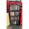 Image 1 : SHELVING UNIT WITH A WIDE SELECTION OF DVDS H-43"