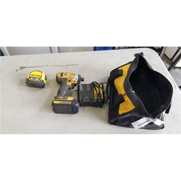 LOT OF DEWALT TOOLS BATTERY AND BATTERY CHARGER AND TAPE MEASURE
