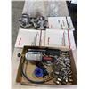 Image 1 : TRAY OF ASSORTED AUTOMOTIVE ITEMS INCLUDING CHEVY CAPS, AND GM MAINTENANCE BOOKS