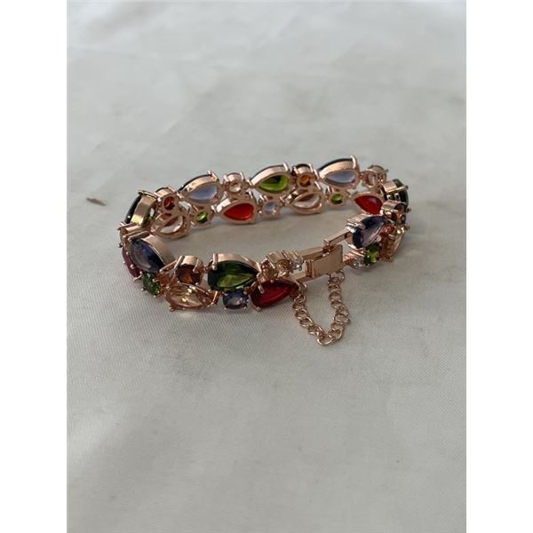 PINK GOLD PLATED W/ VARIOUS COLOUR GLASS STONES PRONGE SET BRACELET W/ SAFETY CHAIN