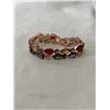 Image 3 : PINK GOLD PLATED W/ VARIOUS COLOUR GLASS STONES PRONGE SET BRACELET W/ SAFETY CHAIN