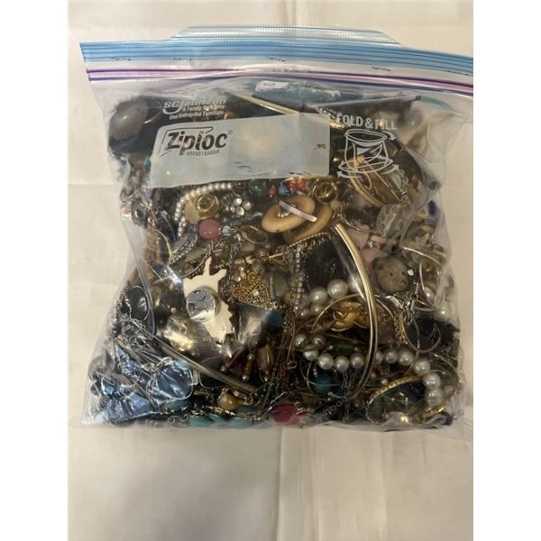 HEAVY LARGE BAG W/ LOTS OF MISC JEWELRY AND PARTS ETC