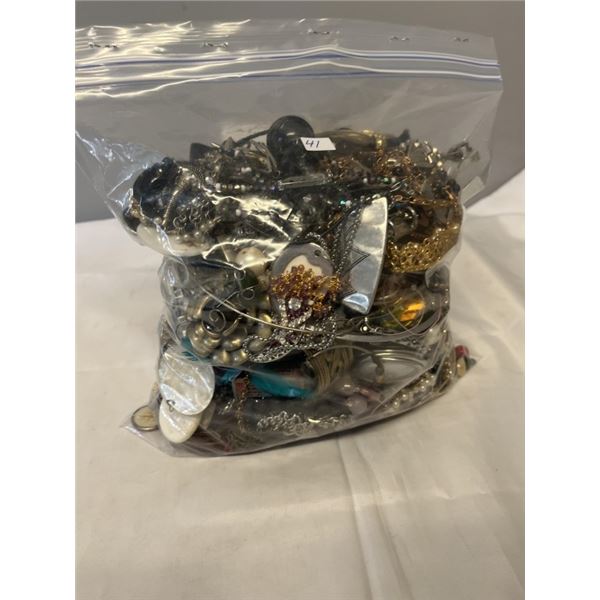 HEAVY LARGE BAG W/ LOTS OF MISC JEWELRY AND PARTS ETC