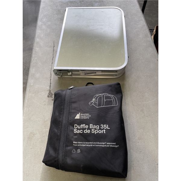 FOLDING ALUMINUM CAMP TABLE AND MEC 35L DUFFELL BAG