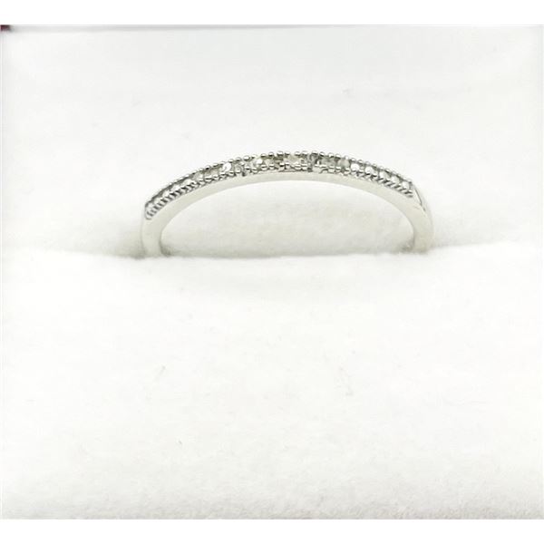 STERLING SILVER NATURAL DIAMOND (0.06CT) BAND, SIZE 7, W/A $345.00. DIAMOND IS THE BIRTHSTONE FOR AP
