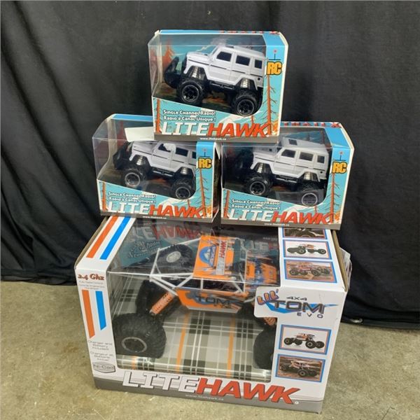 FOUR LITEHAWK RADIO CONTROLLED TRUCKS STORE RETURN UNTESTED