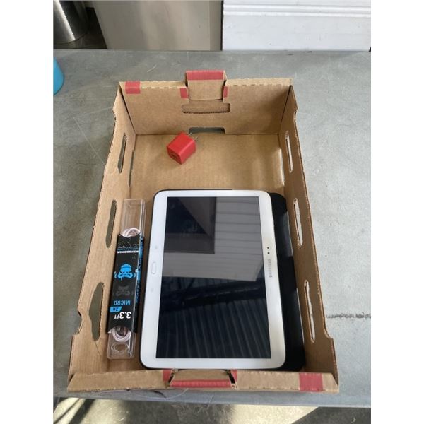 SAMSUNG TABLET W/ NEW CHARGING CORD - WORKING