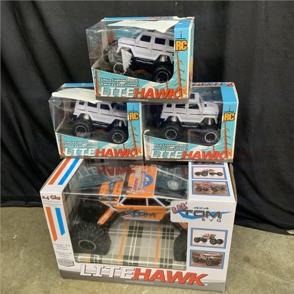 FOUR LITEHAWK RADIO CONTROLLED TRUCKS STORE RETURN UNTESTED