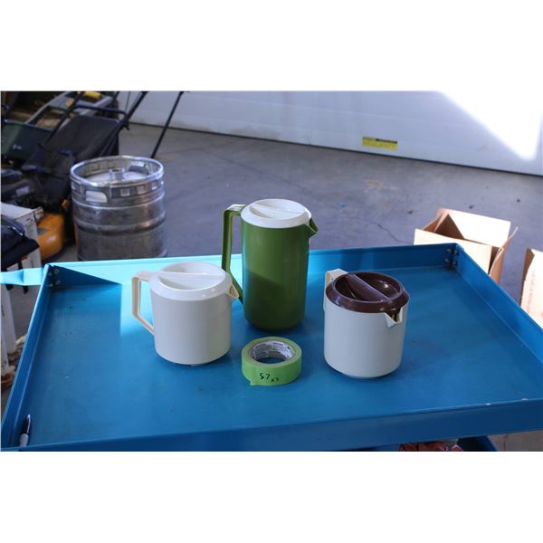 Three Rubbermaid plastic pitchers 