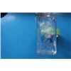 Image 3 : Two clear glass bottles: one cylindrical and one rectangular. The rectangular bottle is embossed wit