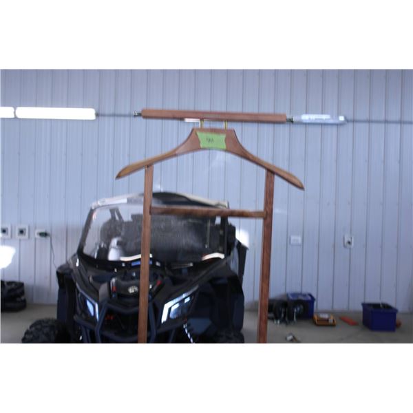 Wooden butler valet stand crafted by Roos Bros, featuring a coat hanger with brass accents and an in