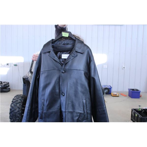 Guy Laroche black leather jacket featuring a button-up front closure and two front pockets. The jack