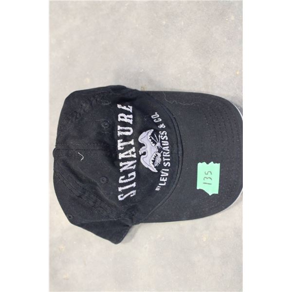 Black adjustable baseball cap featuring the 'Signature Levi Strauss & Co.' branding 