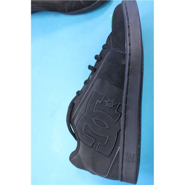 Black DC Shoes casual sneakers featuring an embossed logo on the side