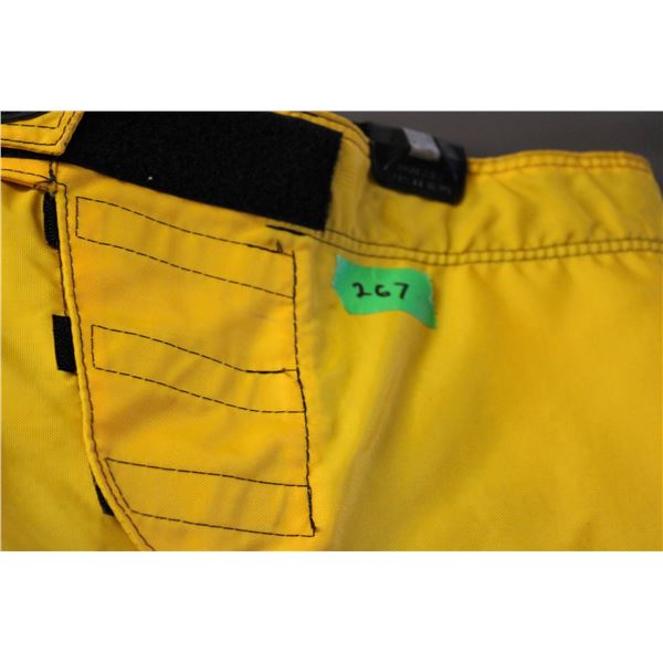 Riding pants in a bold yellow and blue color combination