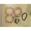 Image 2 : Red jewellery display and bracelets