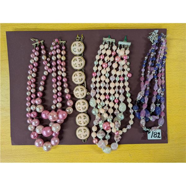 Lot of pink and purple tone necklaces (4)