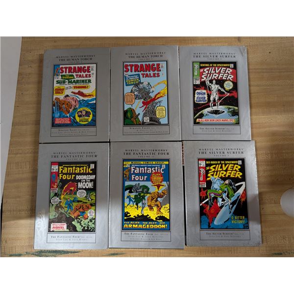 (6) Marvel Masterworks Hard Cover Collection Comic Books "Silver Surfer" "Human Torch" and "Fantasti