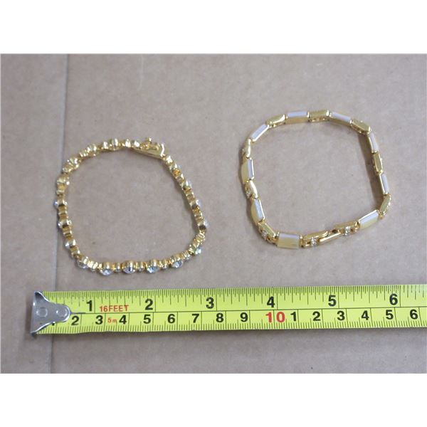 (2) Gold Coloured Bracelets (Both Have Stamps)