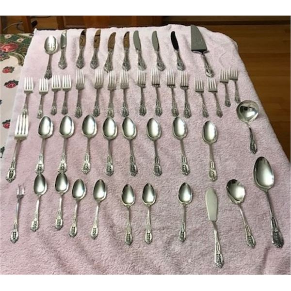 Large Set of Sterling Silverware. “Rose Point” pattern by Wallace