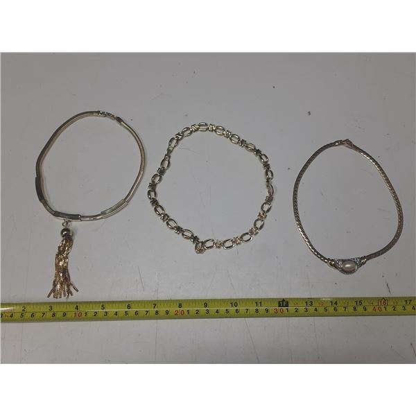 (3) Choker Necklace.