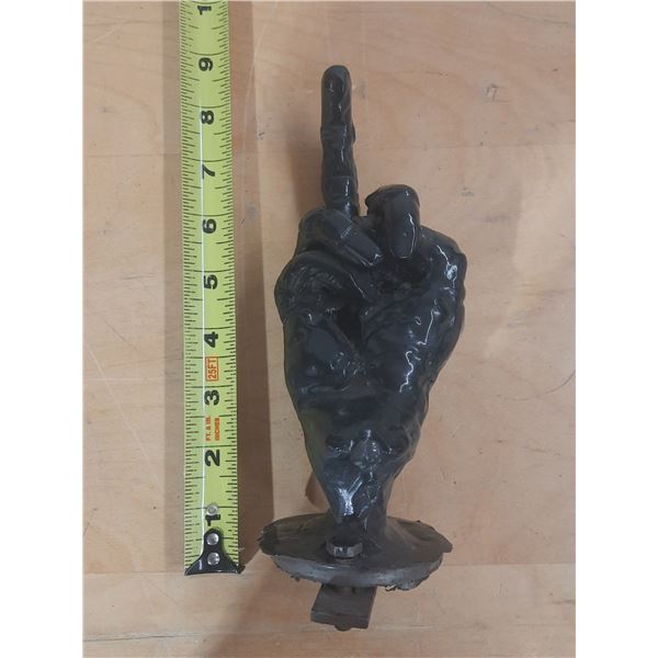 Welded Metal Sculpture Depicting A Middle Finger Gesture.