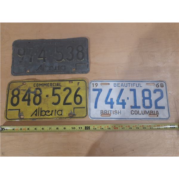 (2) Alberta and (1) British Columbia Licence Plate.