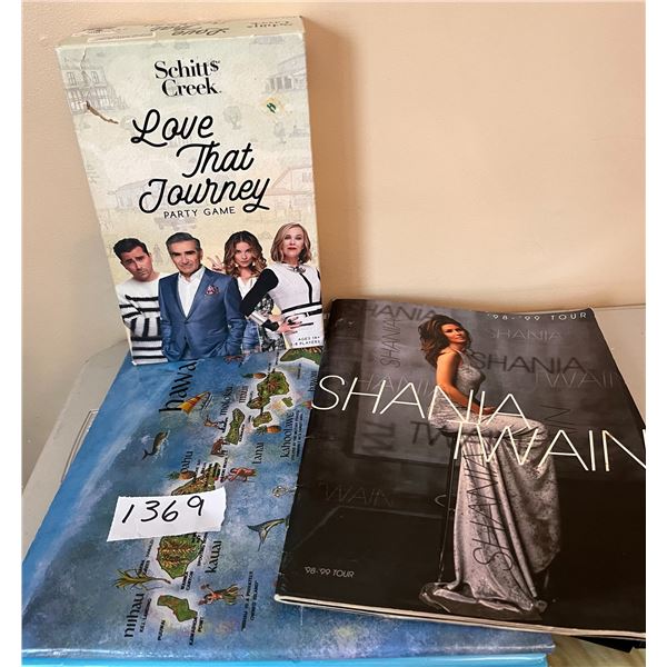 Schitts Creek Game, never played (box damaged) and Shania Twain tour book with photo album