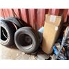 Image 17 : Yellow 20' Shipping Container & Contents: Tires, Shelves, Water Bottles, etc