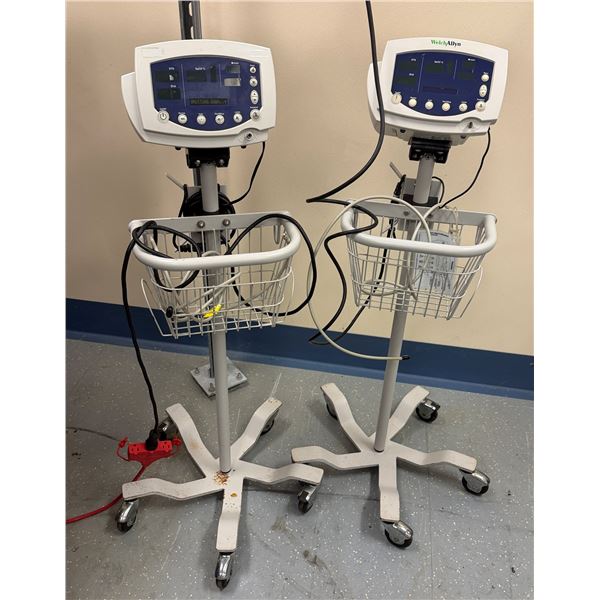 Qty 2 Welch Allyn Patient SpO2 Vital Signs Monitors on Rolling Pole Stands (both power on & show E35