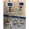 Image 1 : Qty 2 Welch Allyn Patient SpO2 Vital Signs Monitors on Rolling Pole Stands (both power on & show E35