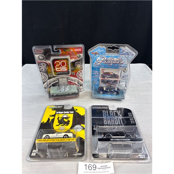 Lot of 4 Diecast Cars in Original Packages Green Light, Black Bandit, Etc.