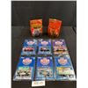 Image 1 : Lot of Action Racing Cars in Package + 2 Winners Circle Figurines in Package