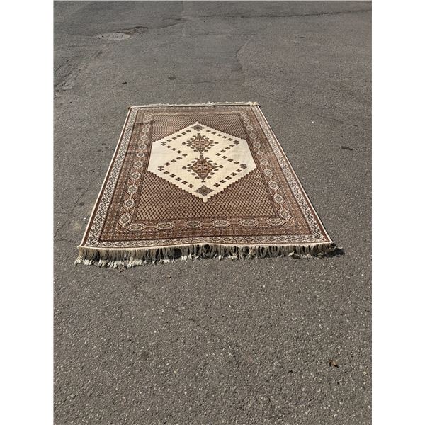 Turkish rug from Libya measures 102" x 67"