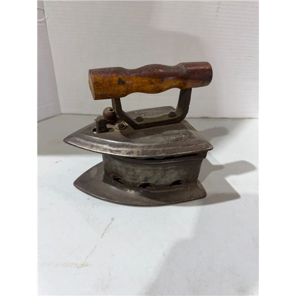 Antique charcoal iron