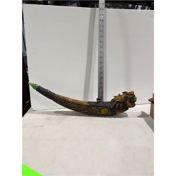 decorative Chinese dragon opium pipe, often used as a home decor collectible.