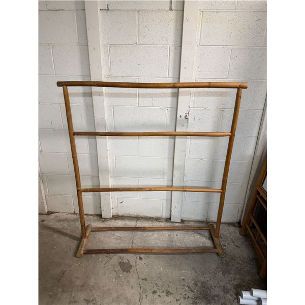 Blanket rack measures 43 1/2 inches long and 48 1/2 inches tall