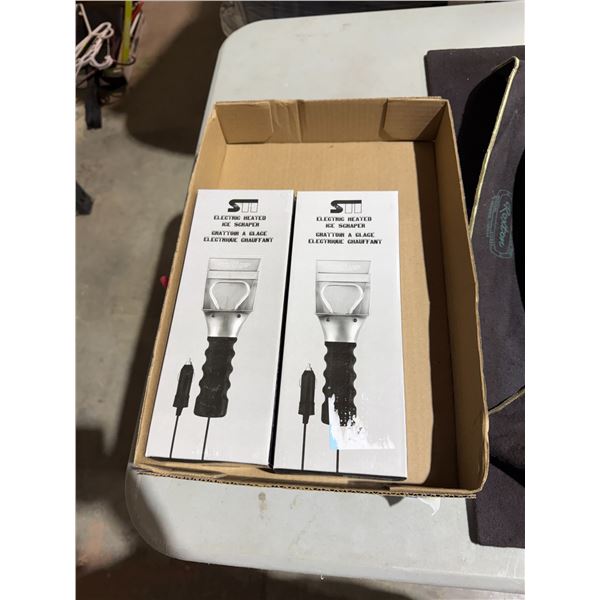 Electric heated ice scrapers