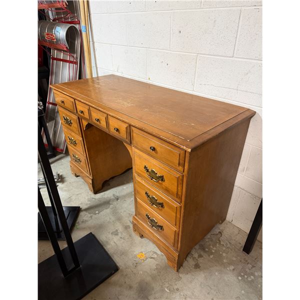 Maple desk measures 49" x 20" x 31"