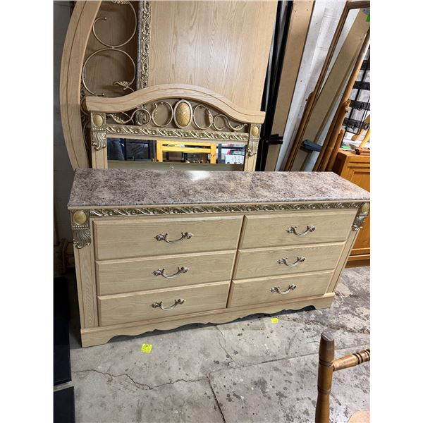 Dresser and mirror measures 63 1/2" x 16" x 34"